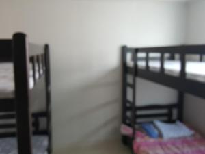 Postel nebo postele na pokoji v ubytování Guest House Manna