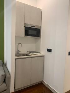 Kuchyň nebo kuchyňský kout v ubytování Cellamare Suite & Spa
