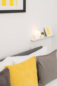 Łóżko lub łóżka w pokoju w obiekcie Prater Balcony Suite