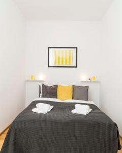 Łóżko lub łóżka w pokoju w obiekcie Prater Balcony Suite