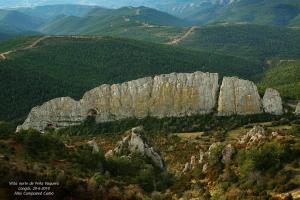 a large rock formation in the middle of a mountain at Casa Rural Las Lezas in Biel