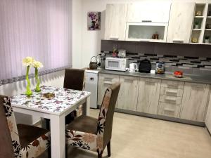Kuchyň nebo kuchyňský kout v ubytování Apartman Bondi