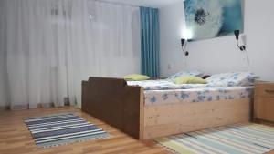 Postel nebo postele na pokoji v ubytování Rolling Stone Hostel