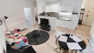 A kitchen or kitchenette at Piacsek Apartmanház