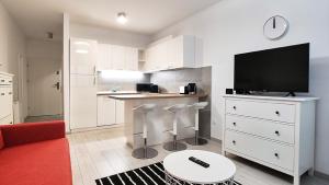 A kitchen or kitchenette at Piacsek Apartmanház