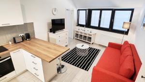 A kitchen or kitchenette at Piacsek Apartmanház