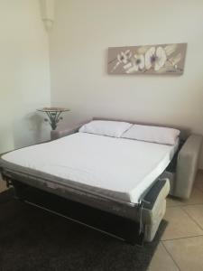 Postel nebo postele na pokoji v ubytování Appartamento A CASA VOSTRA Arnesano Lecce Salento