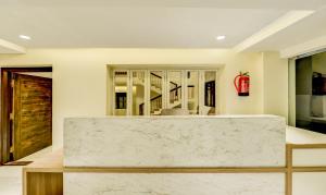 Lobbyn eller receptionsområdet på Itsy By Treebo - Mirra