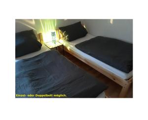 Postel nebo postele na pokoji v ubytování Gästezimmer Wagner
