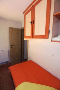 Postel nebo postele na pokoji v ubytování Apartment Pri Leju