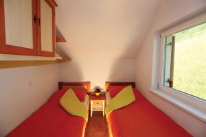 Postel nebo postele na pokoji v ubytování Apartment Pri Leju