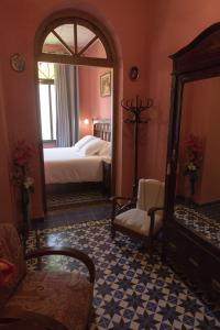 Posteľ alebo postele v izbe v ubytovaní Hotel Casa Ceremines