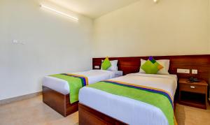 Postelja oz. postelje v sobi nastanitve Zoot Kochi Infopark