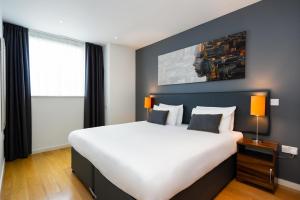 A bed or beds in a room at Staycity Aparthotels London Heathrow 