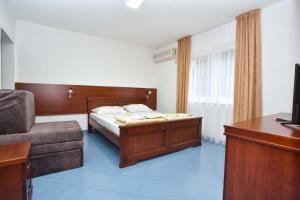 Letto o letti in una camera di Hotel Galeb