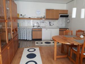 Kuchyňa alebo kuchynka v ubytovaní Appartement Planaiblick + 10 fotografií