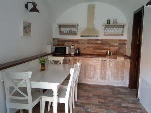 A kitchen or kitchenette at Kálium Vendégház