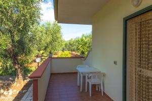 Balkón nebo terasa v ubytování B&B Uliveto del Gargano