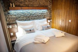 Posteľ alebo postele v izbe v ubytovaní WILLIAM Congress&Wellness Mountain HOTEL ****
