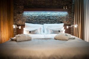 Posteľ alebo postele v izbe v ubytovaní WILLIAM Congress&Wellness Mountain HOTEL ****