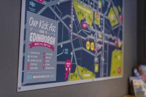 a poster of a subway map on a wall at Kick Ass Greyfriars (18+) in Edinburgh