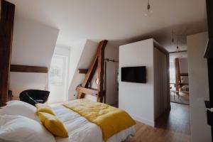 Postel nebo postele na pokoji v ubytování La Villa Guy & Spa - Teritoria
