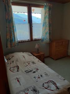 Postel nebo postele na pokoji v ubytování Gîte Les Grands Champs