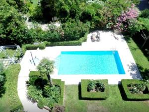 an overhead view of a swimming pool in a garden at Lux Studio our swimming pool and garden in Cannes