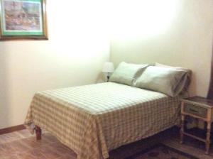 Säng eller sängar i ett rum på Jamaica Dream Gateway