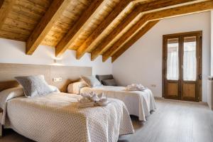 A bed or beds in a room at Casa Marosa