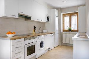 A kitchen or kitchenette at Casa Marosa