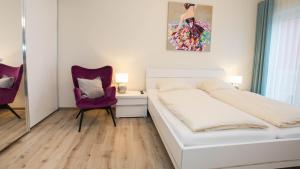 Postel nebo postele na pokoji v ubytování Frühstückshotel Landgasthof Kramer
