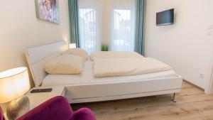Postel nebo postele na pokoji v ubytování Frühstückshotel Landgasthof Kramer