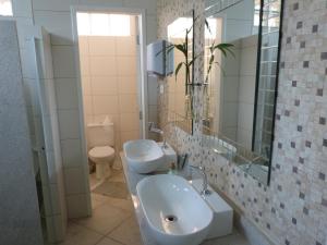 Um banheiro em Zen Hotel Brasil