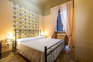 ローマにあるVaticana Ottavianiのベッドルーム(大型ベッド1台、窓付)