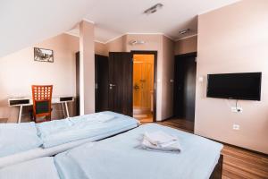 Postel nebo postele na pokoji v ubytování Motel ARD