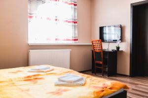Postel nebo postele na pokoji v ubytování Motel ARD