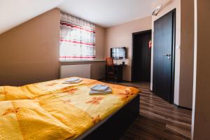 Postel nebo postele na pokoji v ubytování Motel ARD