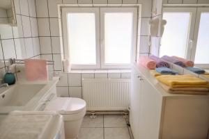 Kúpeľňa v ubytovaní Studio Sweet Home + 15 fotografií
