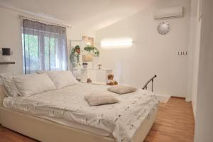Posteľ alebo postele v izbe v ubytovaní Studio Sweet Home