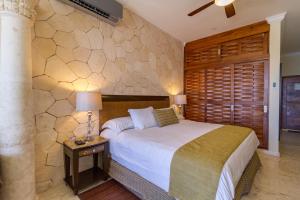 Postel nebo postele na pokoji v ubytování Cielo Maya Beach Tulum