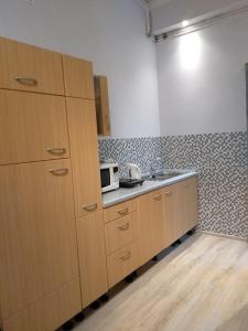 Kuchyňa alebo kuchynka v ubytovaní Hostel Staromiejski