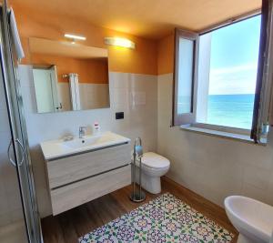 Ein Badezimmer in der Unterkunft Appartamento Belvedere