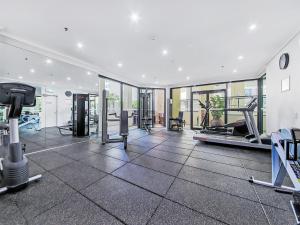 a large room with a lot of glass doors at Quest River Park Central in Brisbane