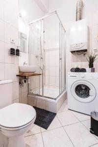 Kúpeľňa v ubytovaní Apartament Niebieski Krakowskie Przedmieście 26
