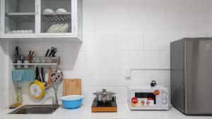Η κουζίνα ή μικρή κουζίνα στο Chic Studio Homestay
