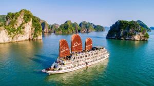 a cruise ship in the water in halong bay at Victory Star Cruise in Ha Long