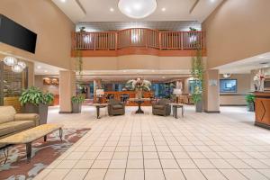 a lobby of a hospital with a staircase at Wingate by Wyndham (Lexington, VA) in Lexington