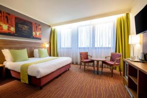 Postel nebo postele na pokoji v ubytování Hotel Opera Antwerpen Centrum