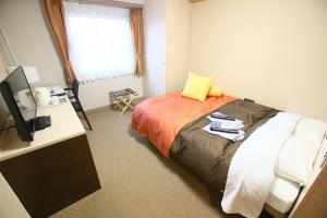 Letto o letti in una camera di Hotel 1-2-3 Maebashi Mercury